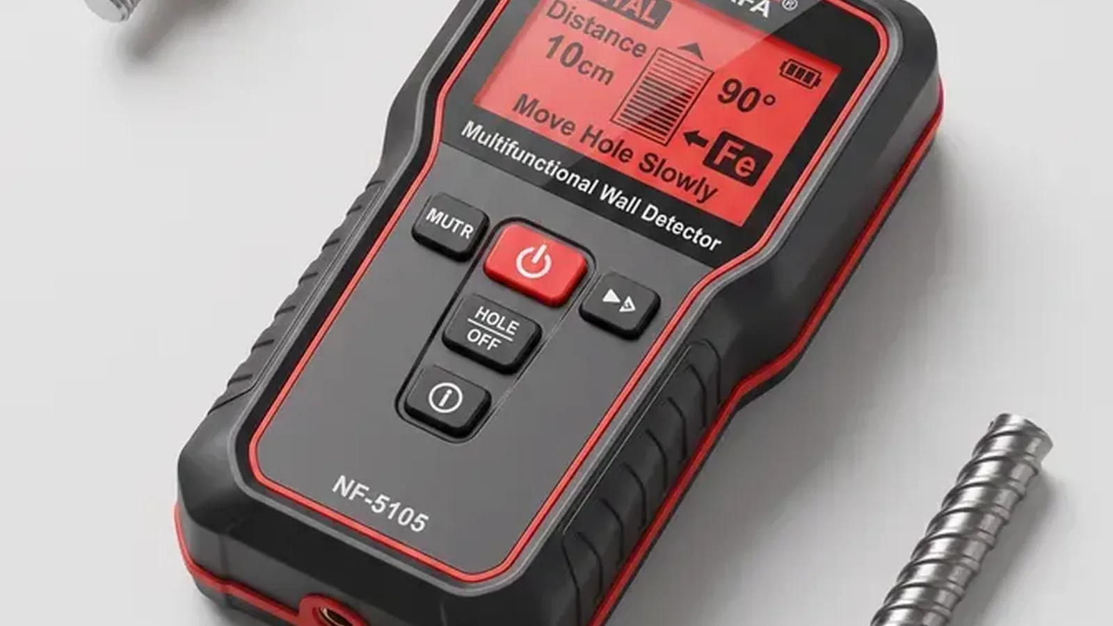 Handheld wall detector with a metal screw beside it